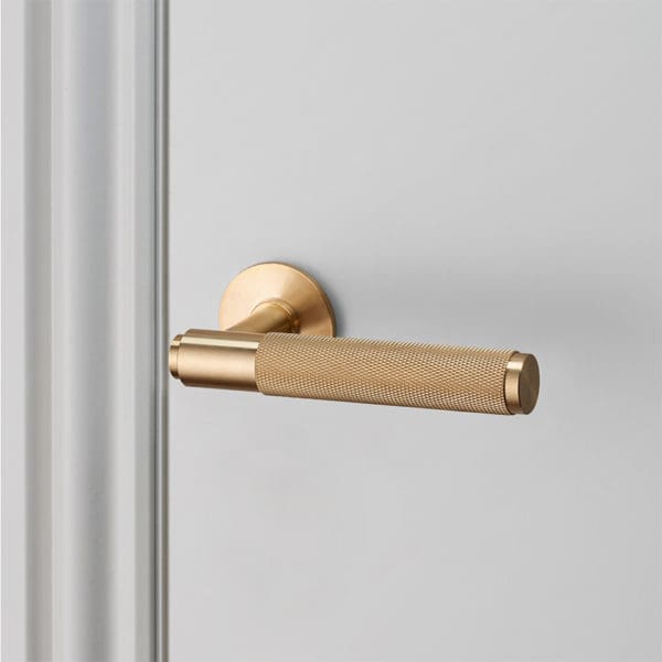 Buster Punch door lever handle brass UNSPRUNG high res sq 960x960px