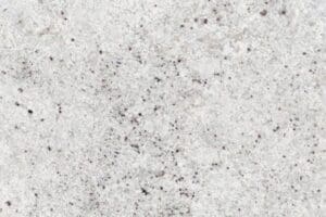 Granit Colonial White detaljbild Granit Colonial White detalj på del av stenblock